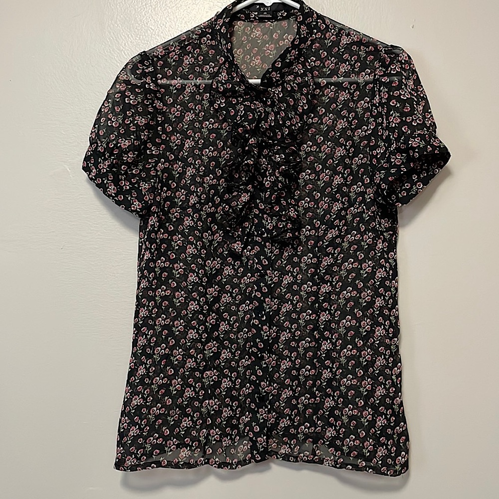 Pretty  sheer black blouse with pink flowers.